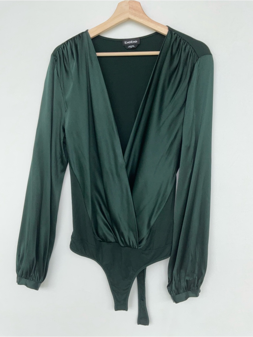 bebe Satin Deep V Wrap Bodysuit in Forest Green